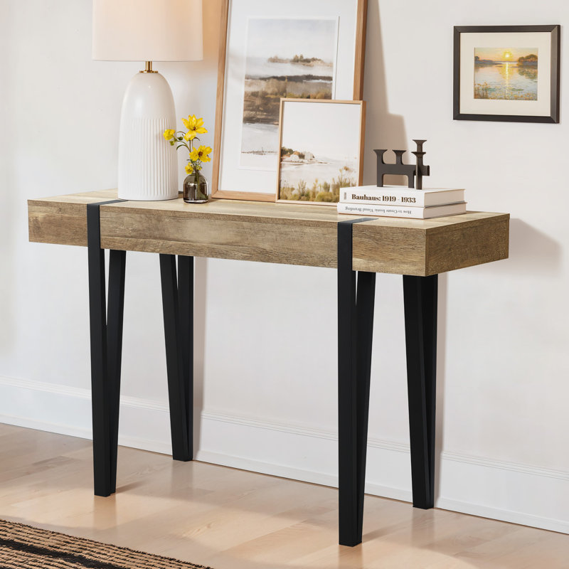 The Art of Visual Equilibrium: How to Style an Oak and Matte Black Console Table